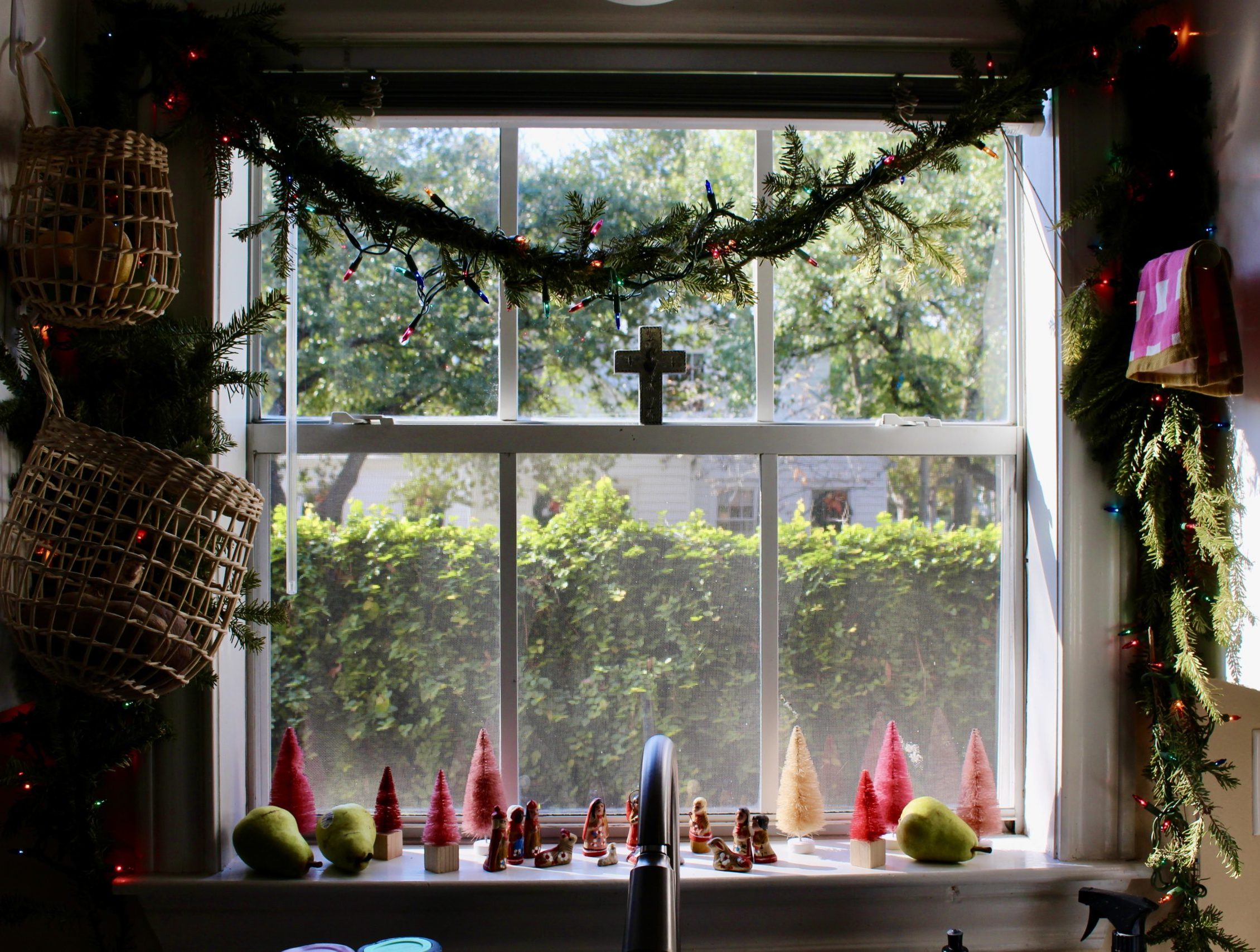Christmas decorations in the kitchen window